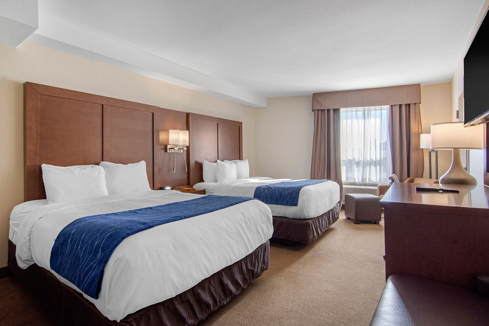 Rooms have been outfitted with modern and bright furnishings, including new beds and bedding, as well as amenities such as 50-inch TVs.